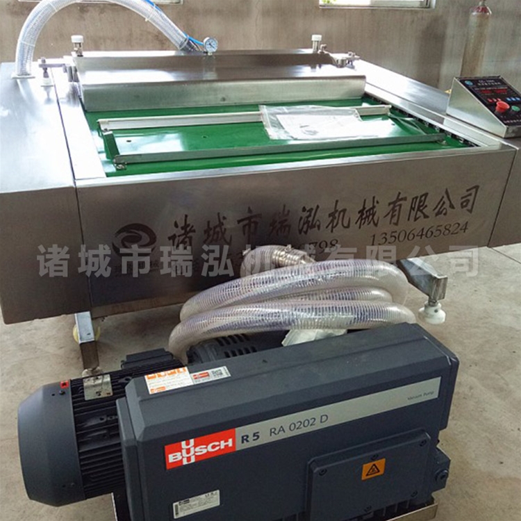 ZBJ1000型连续滚动式真空包装机